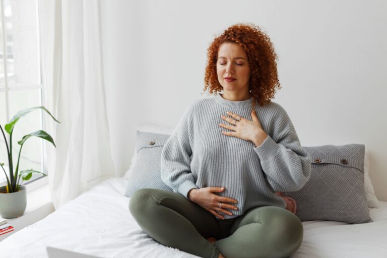 A lady focusing on her breathing.