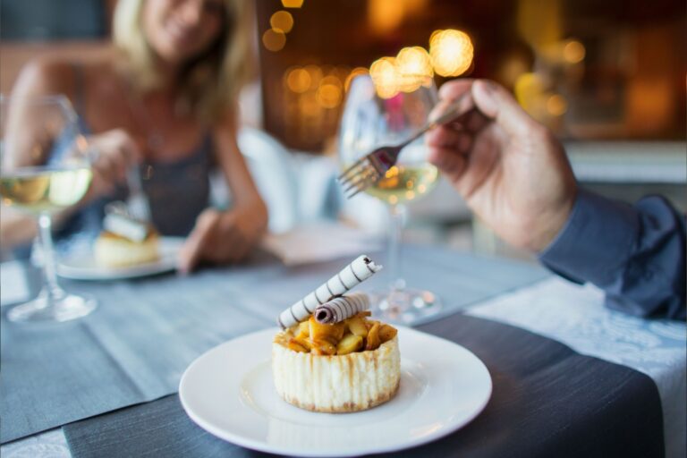 A couple enjoying a meal in a restaurant.